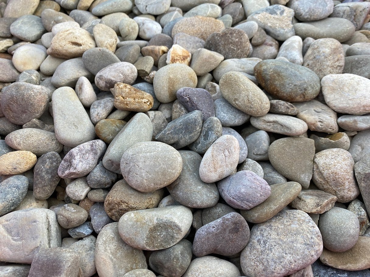 Large gray river pebble